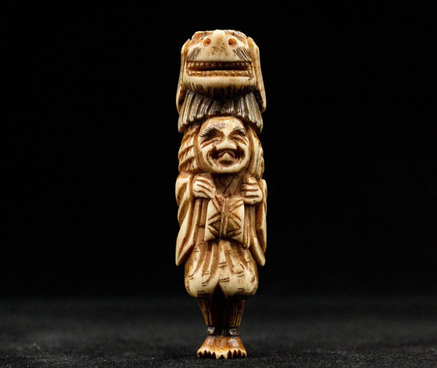 Stag Antler NETSUKE a Man carrying Shihi Japanese Edo - Meiji Antique Vintage